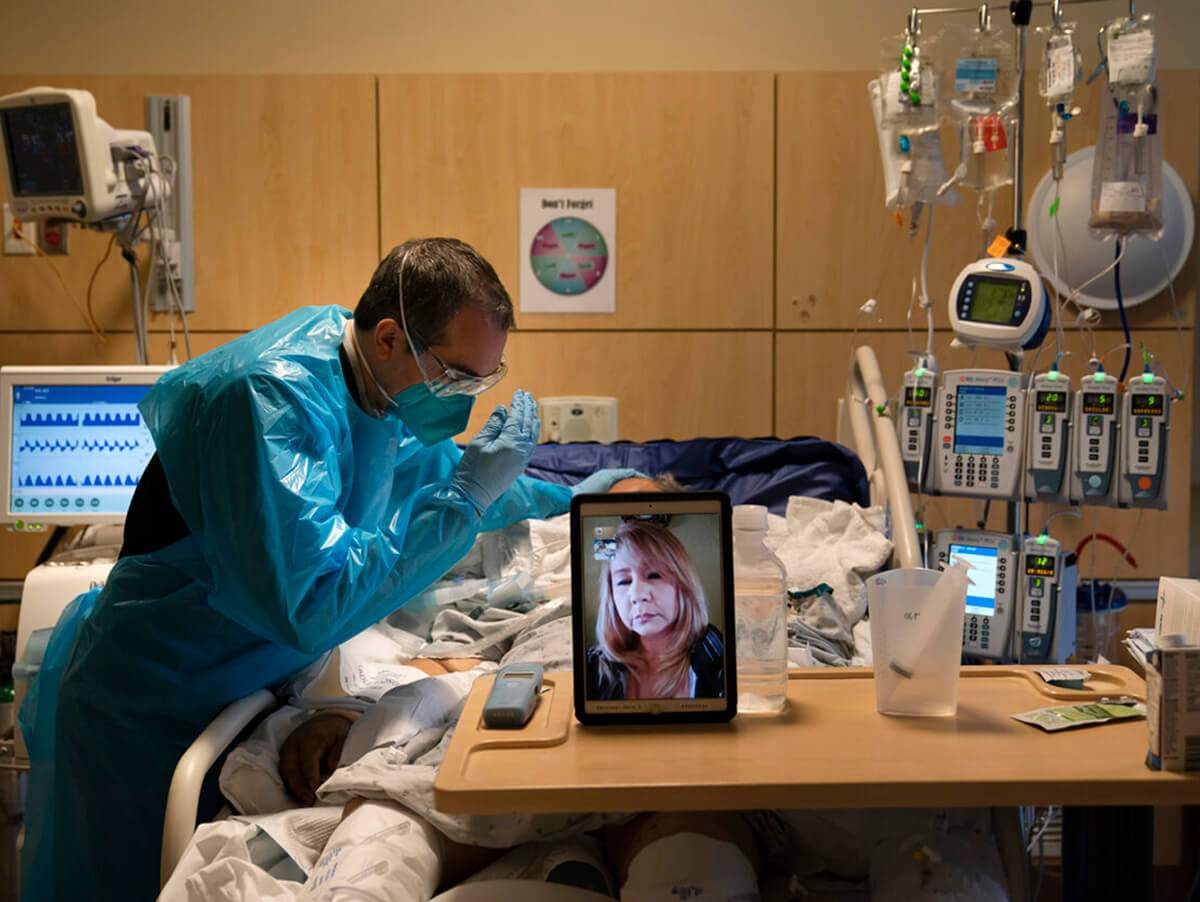 COVID Chaplain Kevin Deegan pictured facilitating a virtual spiritual meeting